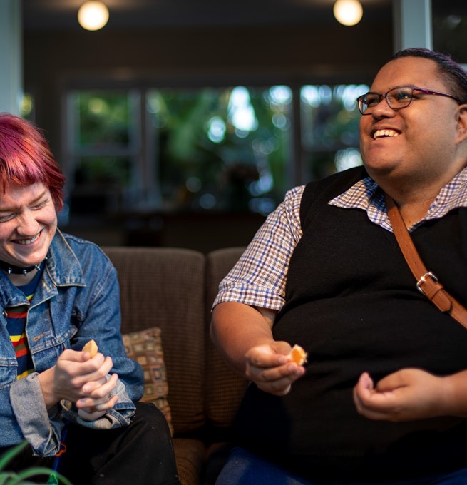 People laughing at a counselling session