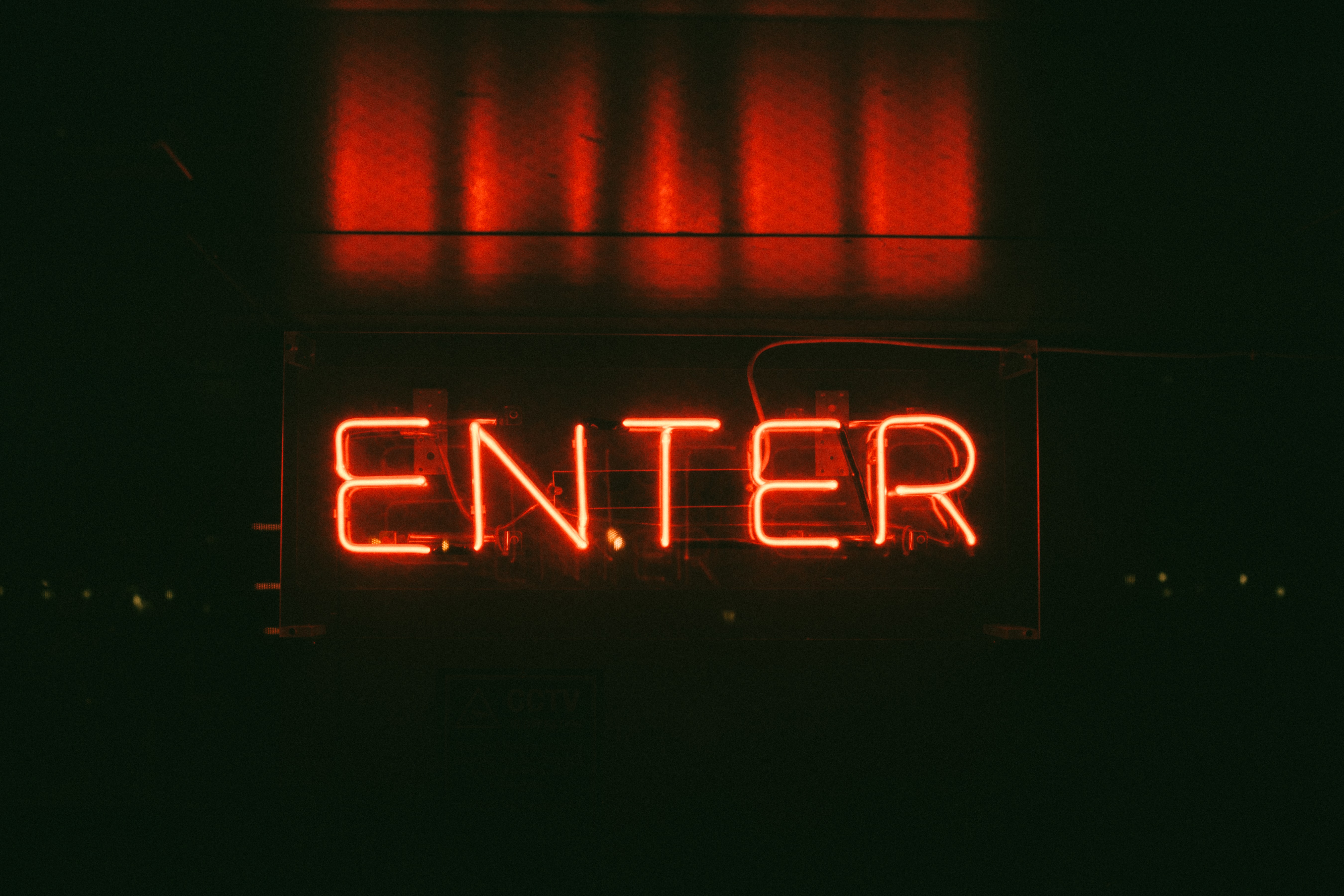 Neon ENTER sign