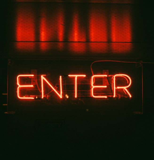 Neon ENTER sign