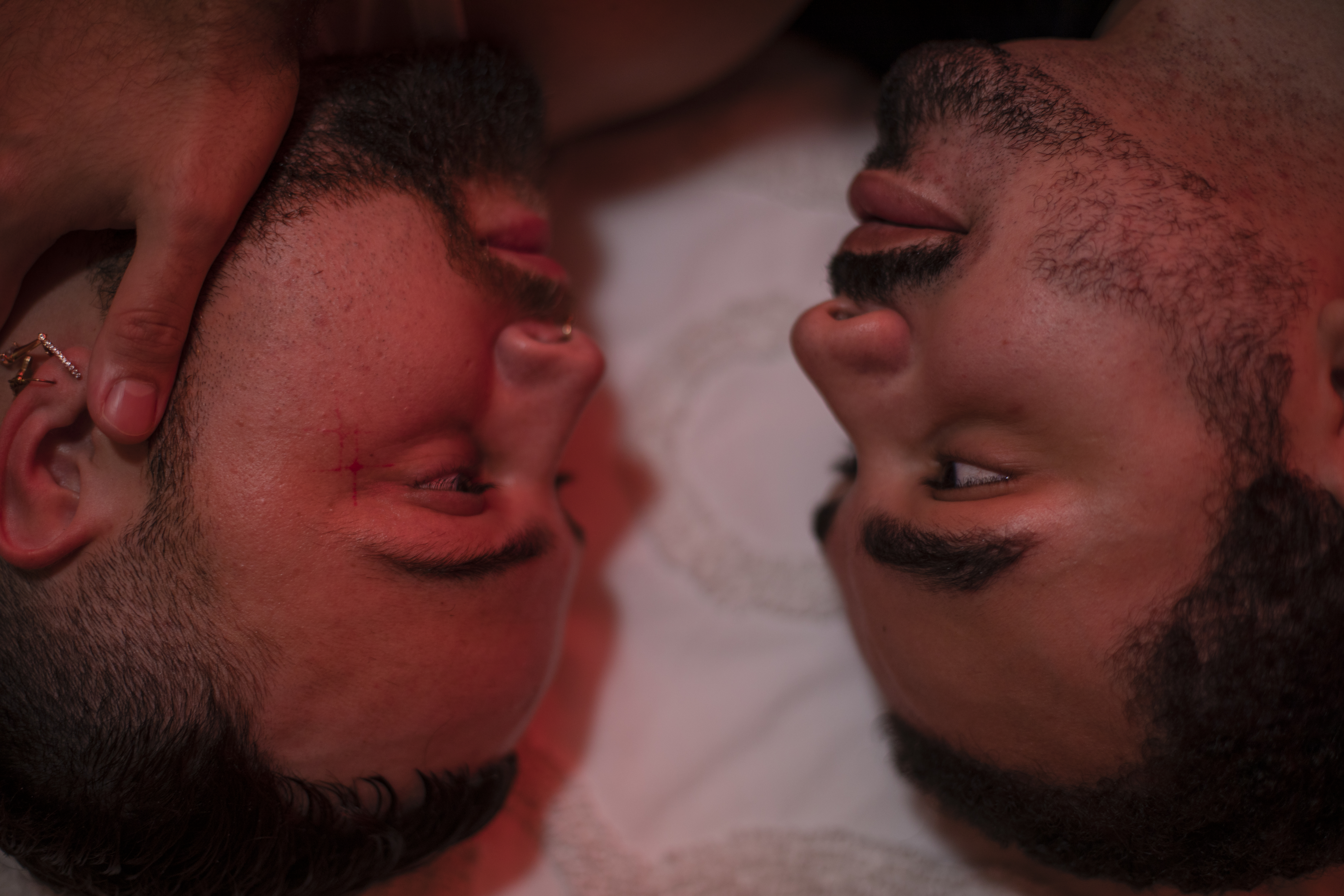 Close up of two people staring into each other's eyes