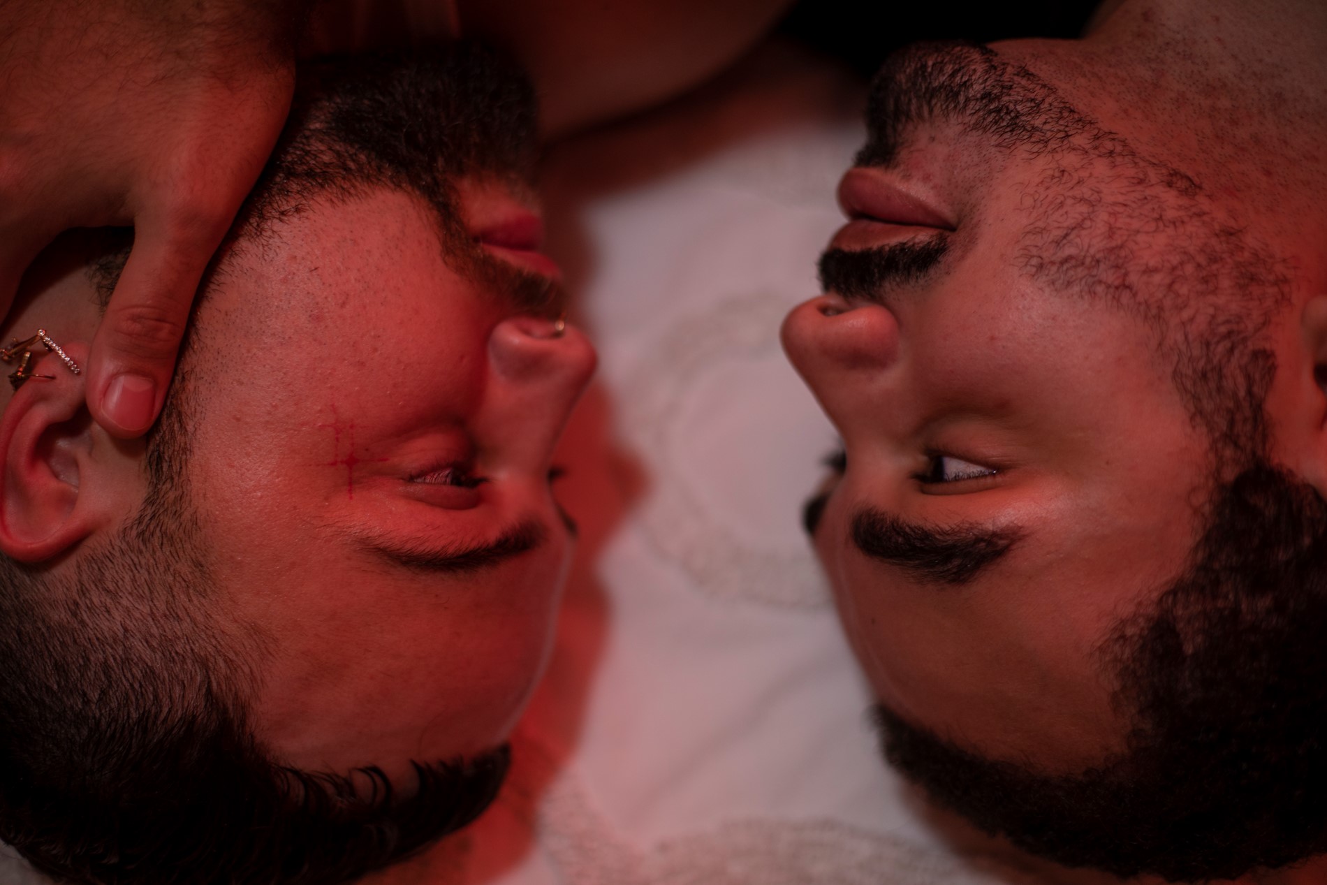Close up of two people staring into each other's eyes